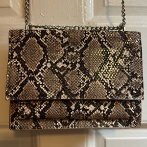 Leopard print crossbody bag.